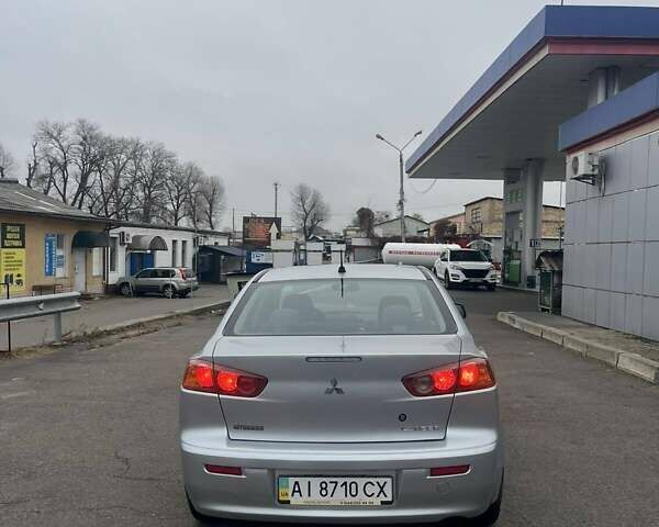 Серый Мицубиси Лансер, объемом двигателя 1.5 л и пробегом 190 тыс. км за 5800 $, фото 6 на Automoto.ua