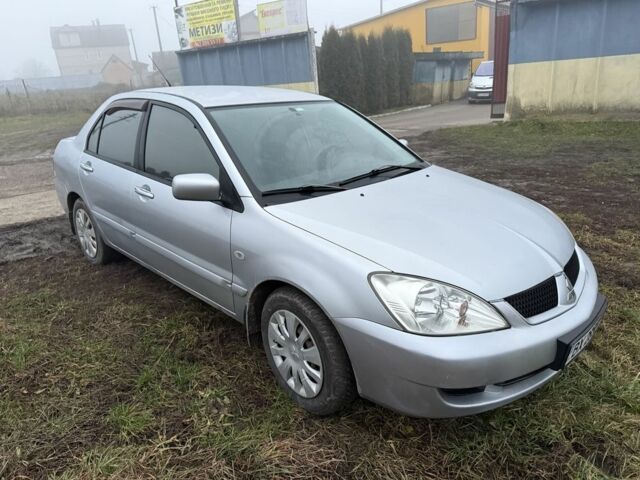 Сірий Міцубісі Lancer, об'ємом двигуна 1.6 л та пробігом 230 тис. км за 3400 $, фото 4 на Automoto.ua