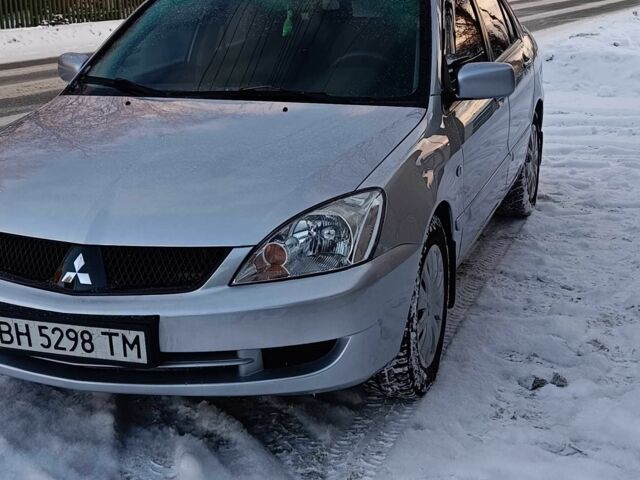 Серый Мицубиси Лансер, объемом двигателя 1.6 л и пробегом 180 тыс. км за 4750 $, фото 3 на Automoto.ua