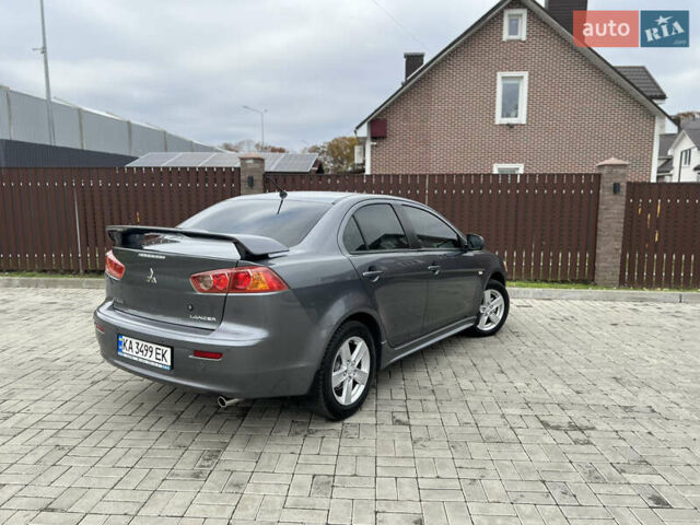 Сірий Міцубісі Lancer, об'ємом двигуна 2 л та пробігом 226 тис. км за 7600 $, фото 2 на Automoto.ua