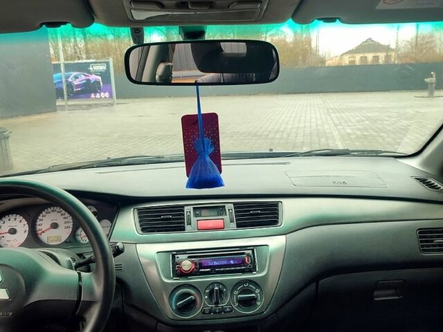 Сірий Міцубісі Lancer, об'ємом двигуна 1.6 л та пробігом 197 тис. км за 3600 $, фото 7 на Automoto.ua