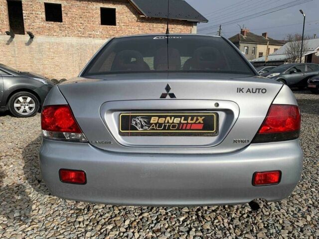 Серый Мицубиси Лансер, объемом двигателя 1.6 л и пробегом 227 тыс. км за 3599 $, фото 4 на Automoto.ua