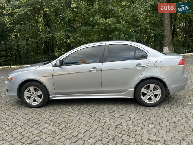 Сірий Міцубісі Lancer, об'ємом двигуна 2 л та пробігом 195 тис. км за 5200 $, фото 6 на Automoto.ua