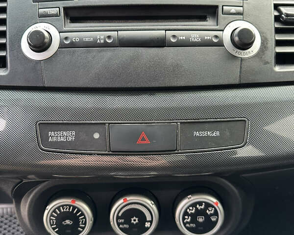 Сірий Міцубісі Lancer, об'ємом двигуна 2 л та пробігом 103 тис. км за 7500 $, фото 21 на Automoto.ua