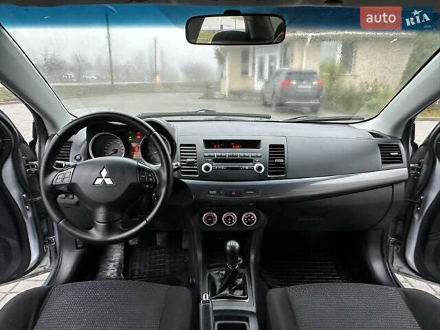 Серый Мицубиси Лансер, объемом двигателя 2 л и пробегом 279 тыс. км за 4999 $, фото 20 на Automoto.ua