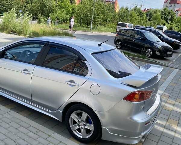 Серый Мицубиси Лансер, объемом двигателя 1.5 л и пробегом 303 тыс. км за 4900 $, фото 24 на Automoto.ua