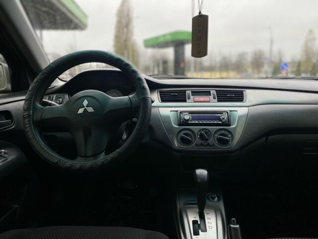 Сірий Міцубісі Lancer, об'ємом двигуна 1.6 л та пробігом 240 тис. км за 4650 $, фото 13 на Automoto.ua