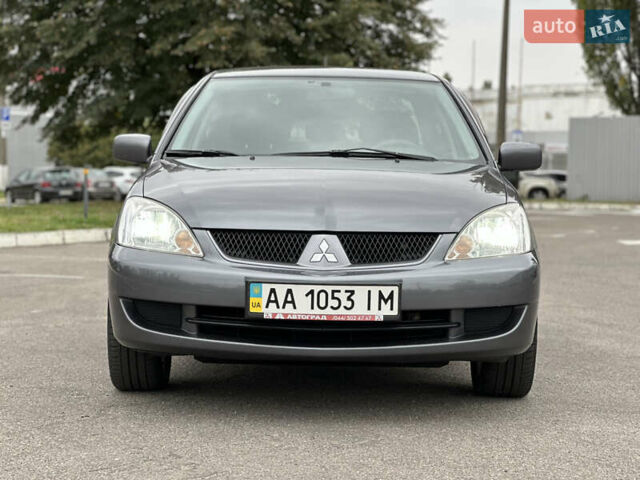 Сірий Міцубісі Lancer, об'ємом двигуна 1.58 л та пробігом 94 тис. км за 6500 $, фото 5 на Automoto.ua