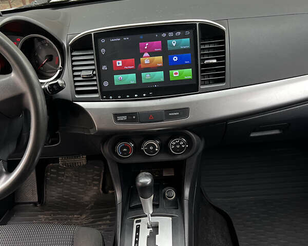 Сірий Міцубісі Lancer, об'ємом двигуна 1.5 л та пробігом 160 тис. км за 6300 $, фото 10 на Automoto.ua