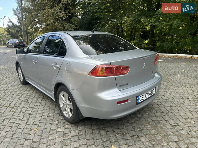 Сірий Міцубісі Lancer, об'ємом двигуна 2 л та пробігом 195 тис. км за 5200 $, фото 5 на Automoto.ua