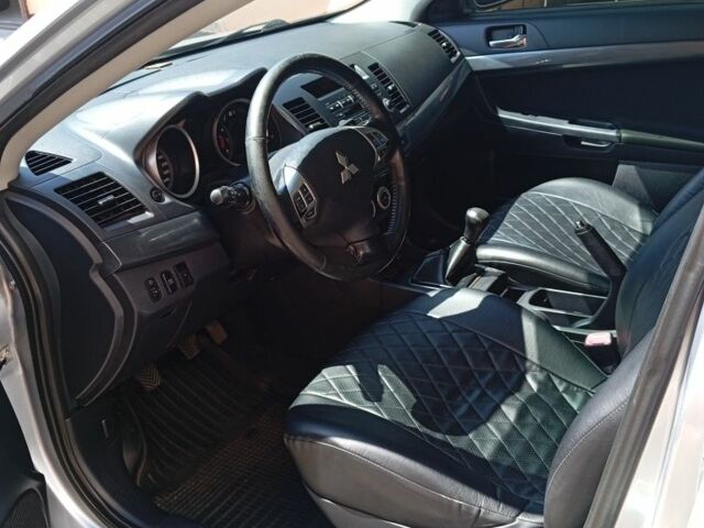 Сірий Міцубісі Lancer, об'ємом двигуна 2 л та пробігом 170 тис. км за 7500 $, фото 6 на Automoto.ua