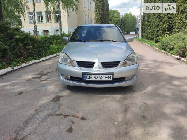 Сірий Міцубісі Lancer, об'ємом двигуна 1.6 л та пробігом 180 тис. км за 5350 $, фото 3 на Automoto.ua