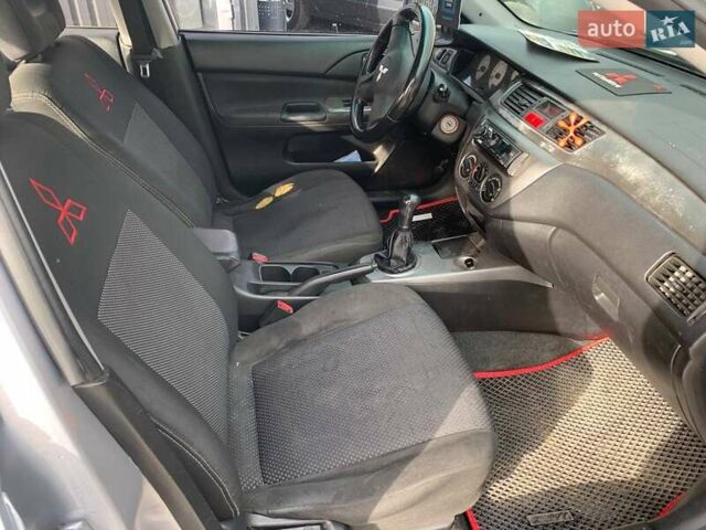 Серый Мицубиси Лансер, объемом двигателя 1.58 л и пробегом 227 тыс. км за 3599 $, фото 15 на Automoto.ua