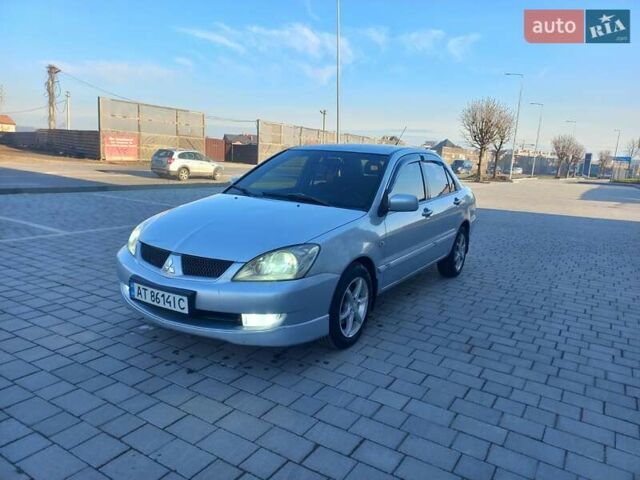 Серый Мицубиси Лансер, объемом двигателя 1.6 л и пробегом 228 тыс. км за 3450 $, фото 4 на Automoto.ua