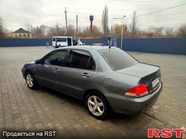 Сірий Міцубісі Lancer, об'ємом двигуна 1.6 л та пробігом 197 тис. км за 3600 $, фото 2 на Automoto.ua