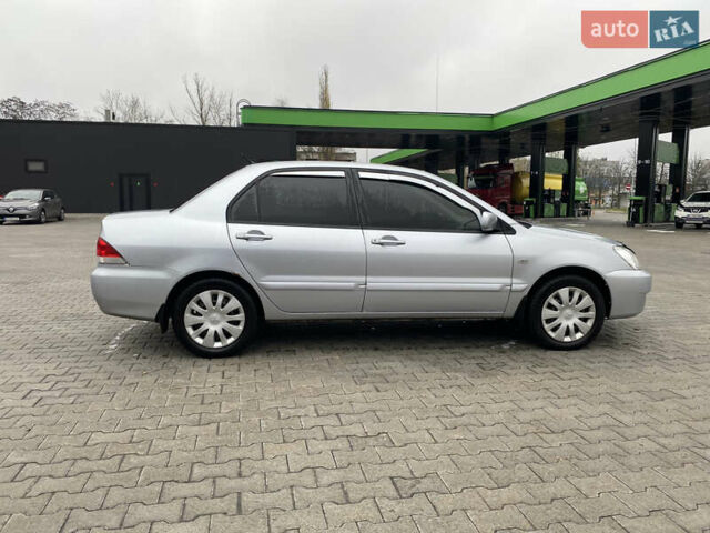 Сірий Міцубісі Lancer, об'ємом двигуна 1.58 л та пробігом 280 тис. км за 4650 $, фото 7 на Automoto.ua