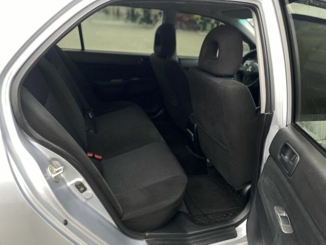 Сірий Міцубісі Lancer, об'ємом двигуна 1.6 л та пробігом 240 тис. км за 4650 $, фото 12 на Automoto.ua