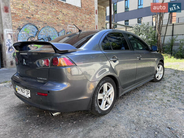 Серый Мицубиси Лансер, объемом двигателя 2 л и пробегом 222 тыс. км за 6999 $, фото 4 на Automoto.ua