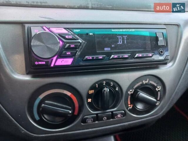 Серый Мицубиси Лансер, объемом двигателя 1.6 л и пробегом 228 тыс. км за 2999 $, фото 35 на Automoto.ua