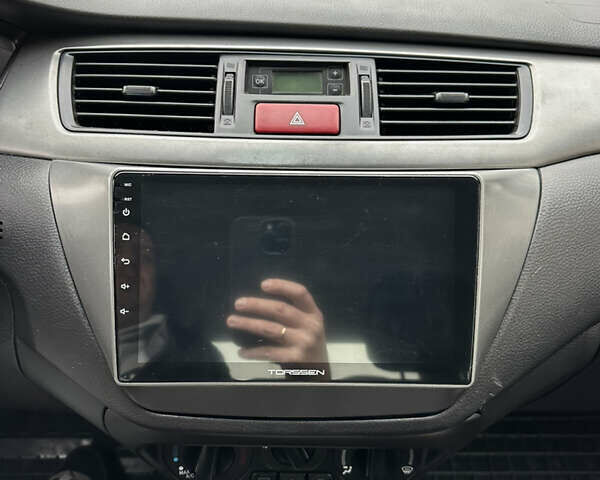 Мицубиси Лансер 2009 в Киеве на Automoto.ua Серый Мицубиси Лансер, объемом двигателя 1.58 л и пробегом 94 тыс. км за 5990 $, фото 25 на Automoto.ua