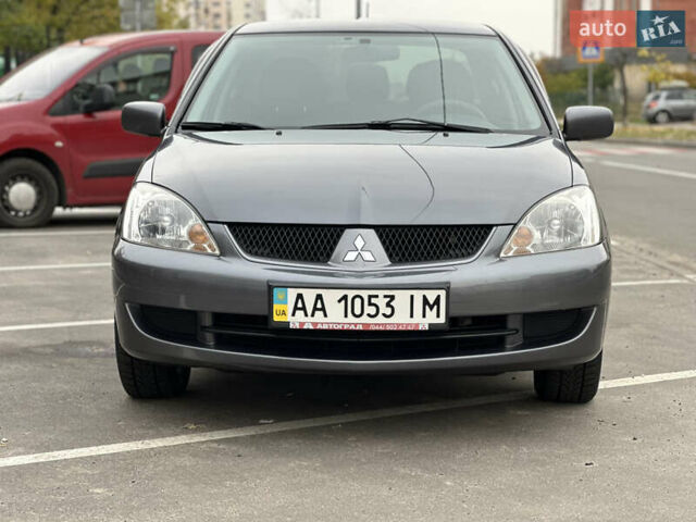 Мицубиси Лансер 2009 в Киеве на Automoto.ua Серый Мицубиси Лансер, объемом двигателя 1.58 л и пробегом 94 тыс. км за 5990 $, фото 1 на Automoto.ua