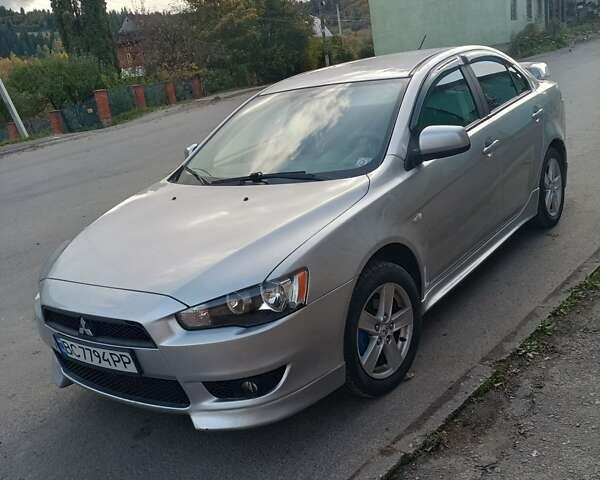 Серый Мицубиси Лансер, объемом двигателя 1.5 л и пробегом 304 тыс. км за 5200 $, фото 1 на Automoto.ua