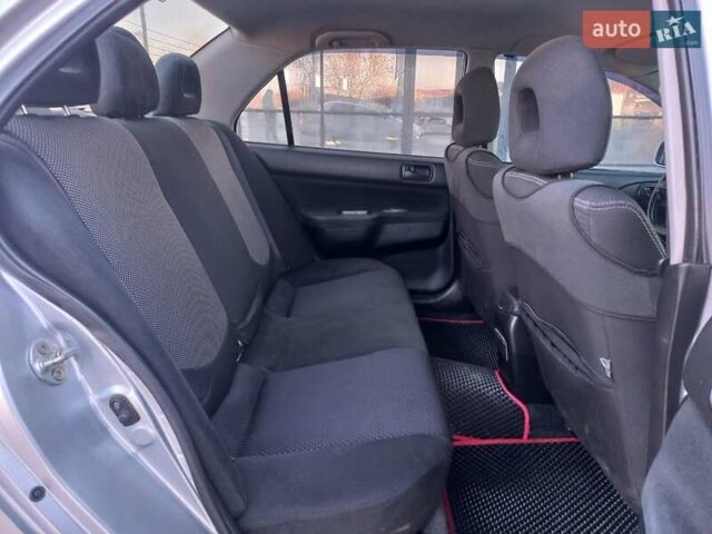 Серый Мицубиси Лансер, объемом двигателя 1.6 л и пробегом 228 тыс. км за 2999 $, фото 24 на Automoto.ua