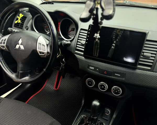 Сірий Міцубісі Lancer, об'ємом двигуна 2 л та пробігом 194 тис. км за 6500 $, фото 12 на Automoto.ua