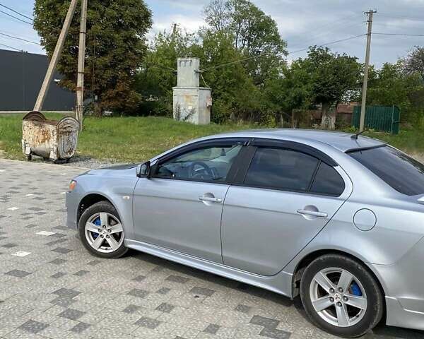 Серый Мицубиси Лансер, объемом двигателя 1.5 л и пробегом 303 тыс. км за 4900 $, фото 31 на Automoto.ua