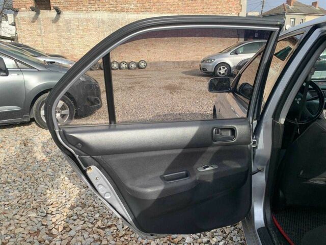 Серый Мицубиси Лансер, объемом двигателя 1.6 л и пробегом 227 тыс. км за 3599 $, фото 9 на Automoto.ua