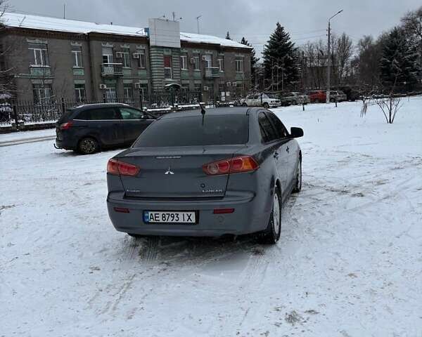 Серый Мицубиси Лансер, объемом двигателя 2 л и пробегом 187 тыс. км за 7000 $, фото 8 на Automoto.ua