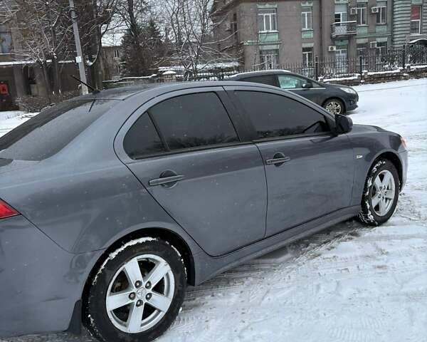 Серый Мицубиси Лансер, объемом двигателя 2 л и пробегом 187 тыс. км за 7000 $, фото 18 на Automoto.ua