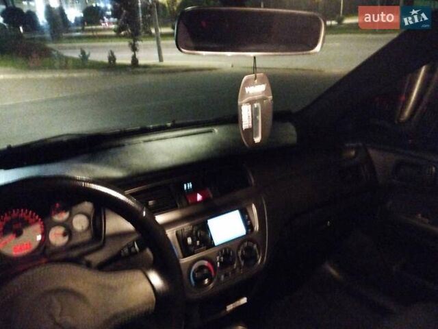 Сірий Міцубісі Lancer, об'ємом двигуна 1.58 л та пробігом 209 тис. км за 2900 $, фото 3 на Automoto.ua