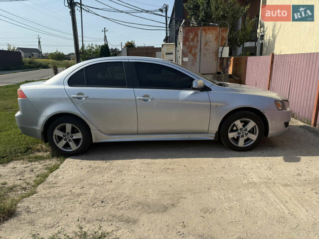 Серый Мицубиси Лансер, объемом двигателя 2 л и пробегом 439 тыс. км за 8000 $, фото 3 на Automoto.ua