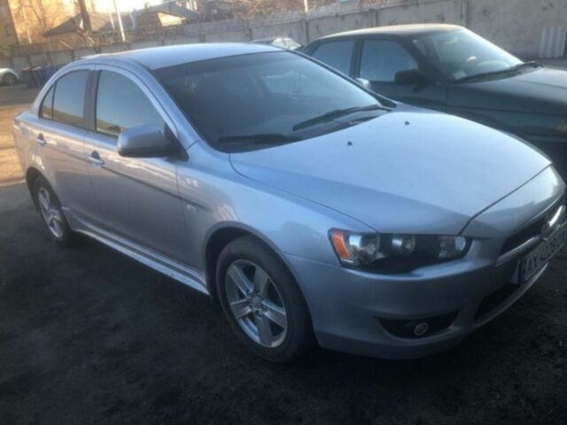 Серый Мицубиси Лансер, объемом двигателя 2 л и пробегом 171 тыс. км за 6200 $, фото 2 на Automoto.ua