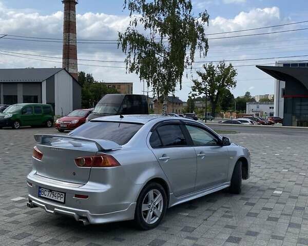 Серый Мицубиси Лансер, объемом двигателя 1.5 л и пробегом 303 тыс. км за 4900 $, фото 7 на Automoto.ua