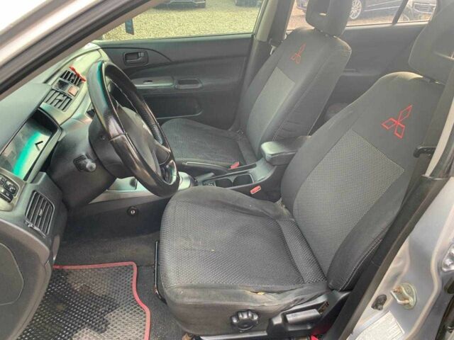 Серый Мицубиси Лансер, объемом двигателя 1.6 л и пробегом 227 тыс. км за 3599 $, фото 20 на Automoto.ua