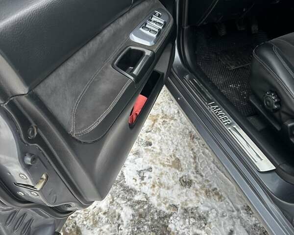 Сірий Міцубісі Lancer, об'ємом двигуна 1.58 л та пробігом 119 тис. км за 7200 $, фото 4 на Automoto.ua