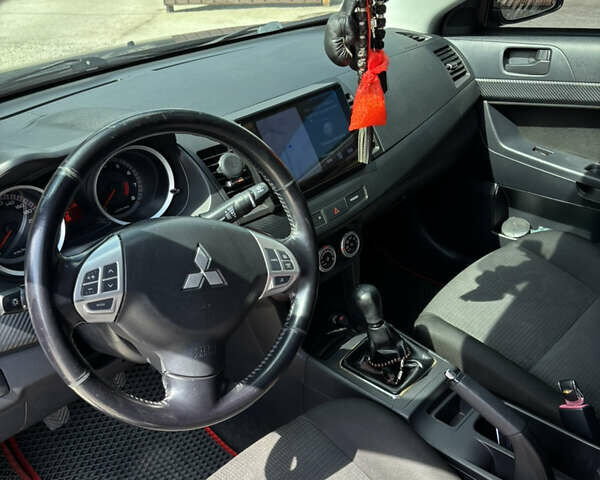 Сірий Міцубісі Lancer, об'ємом двигуна 2 л та пробігом 194 тис. км за 6500 $, фото 13 на Automoto.ua