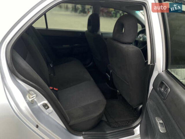 Сірий Міцубісі Lancer, об'ємом двигуна 1.58 л та пробігом 280 тис. км за 4650 $, фото 9 на Automoto.ua