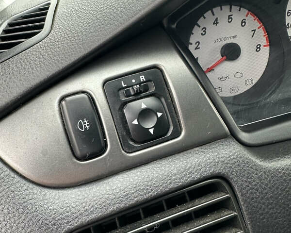 Сірий Міцубісі Lancer, об'ємом двигуна 1.58 л та пробігом 94 тис. км за 6500 $, фото 19 на Automoto.ua