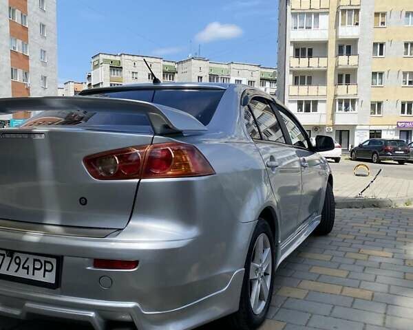 Серый Мицубиси Лансер, объемом двигателя 1.5 л и пробегом 303 тыс. км за 4900 $, фото 16 на Automoto.ua