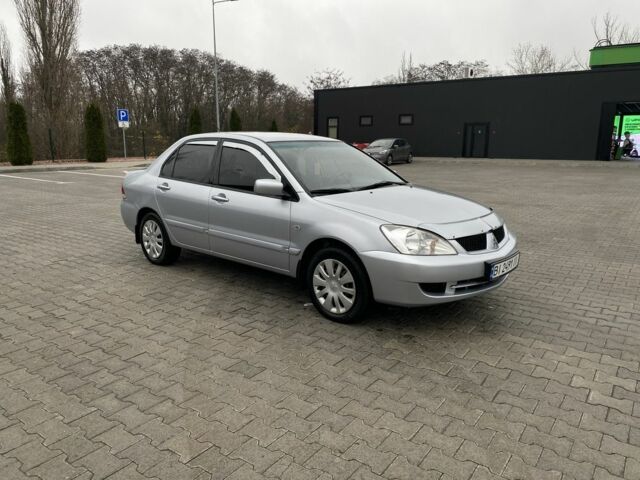 Сірий Міцубісі Lancer, об'ємом двигуна 1.6 л та пробігом 240 тис. км за 4650 $, фото 1 на Automoto.ua