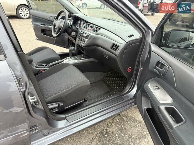 Сірий Міцубісі Lancer, об'ємом двигуна 0 л та пробігом 62 тис. км за 7250 $, фото 12 на Automoto.ua