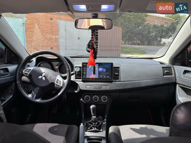 Сірий Міцубісі Lancer, об'ємом двигуна 2 л та пробігом 194 тис. км за 6500 $, фото 16 на Automoto.ua