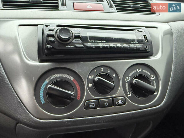 Сірий Міцубісі Lancer, об'ємом двигуна 0 л та пробігом 62 тис. км за 7250 $, фото 25 на Automoto.ua