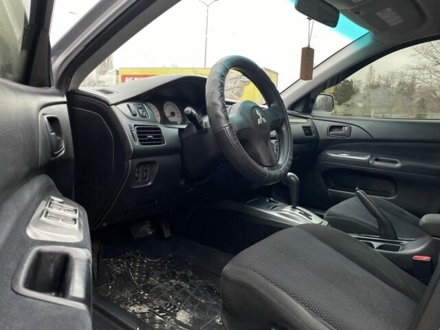 Сірий Міцубісі Lancer, об'ємом двигуна 1.6 л та пробігом 240 тис. км за 4650 $, фото 11 на Automoto.ua