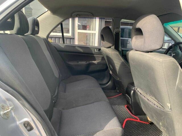 Серый Мицубиси Лансер, объемом двигателя 1.6 л и пробегом 227 тыс. км за 3599 $, фото 16 на Automoto.ua