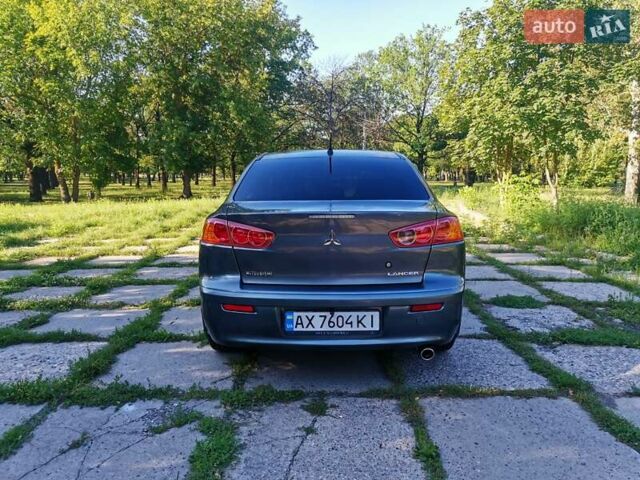 Серый Мицубиси Лансер, объемом двигателя 1.5 л и пробегом 183 тыс. км за 5900 $, фото 1 на Automoto.ua