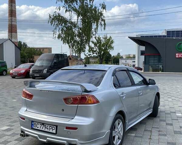 Серый Мицубиси Лансер, объемом двигателя 1.5 л и пробегом 303 тыс. км за 4900 $, фото 21 на Automoto.ua